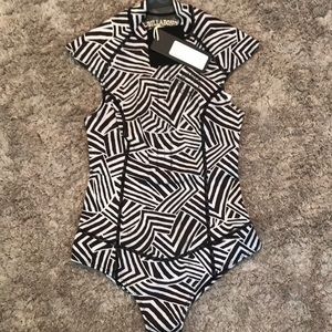 Billabong Woman’s Sz 4 sleeveless wetsuit 1mm